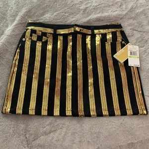 Michael Kors Black/gold denim skirt. Size 4. NWT.